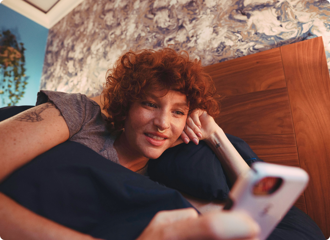 woman looking at her mobile phone