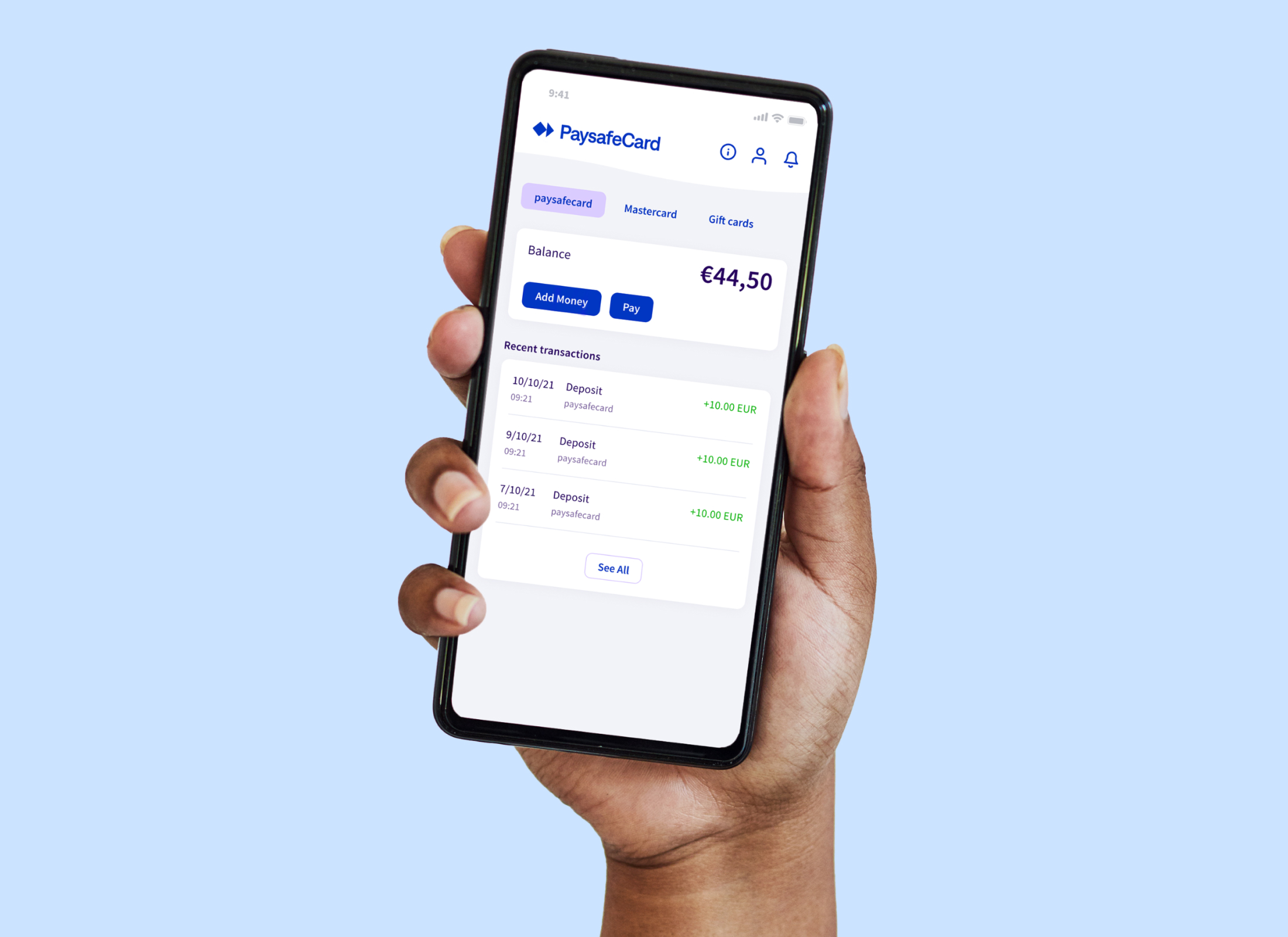 hand holding mobile phone with PaysafeCard app open