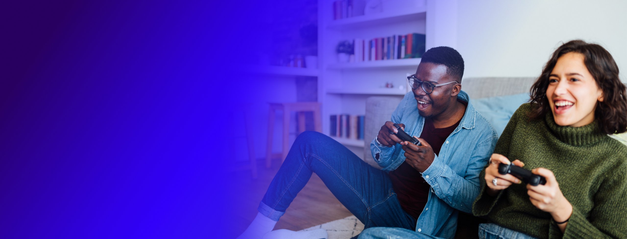 Two people playing a video game on a game console